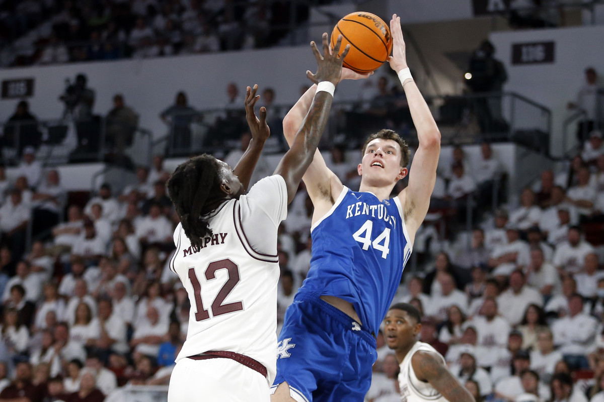 Feb 27, 2024; Starkville, Mississippi, USA; Kentucky Wildcats forward Zvonimir Ivisic (44) shoots as Mississippi State Bulldogs forward KeShawn Murphy (12) defends during the second half at Humphrey Coliseum. Mandatory Credit: Petre Thomas-USA TODAY Sports